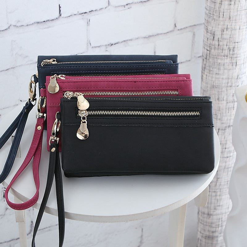 2021 new PU Ms. long purse female Korean retro Handbag Purse Hand bag one generation